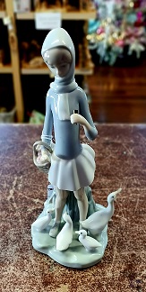 Lady Feeding Ducks LLARDO