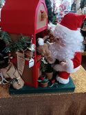 Santa Feeding Deer In Barn Animated