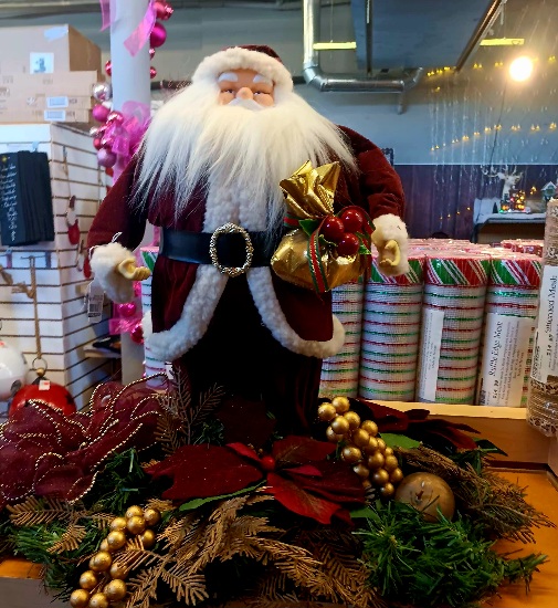 Santa In Floral Arrangement