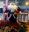 Santa In Floral Arrangement